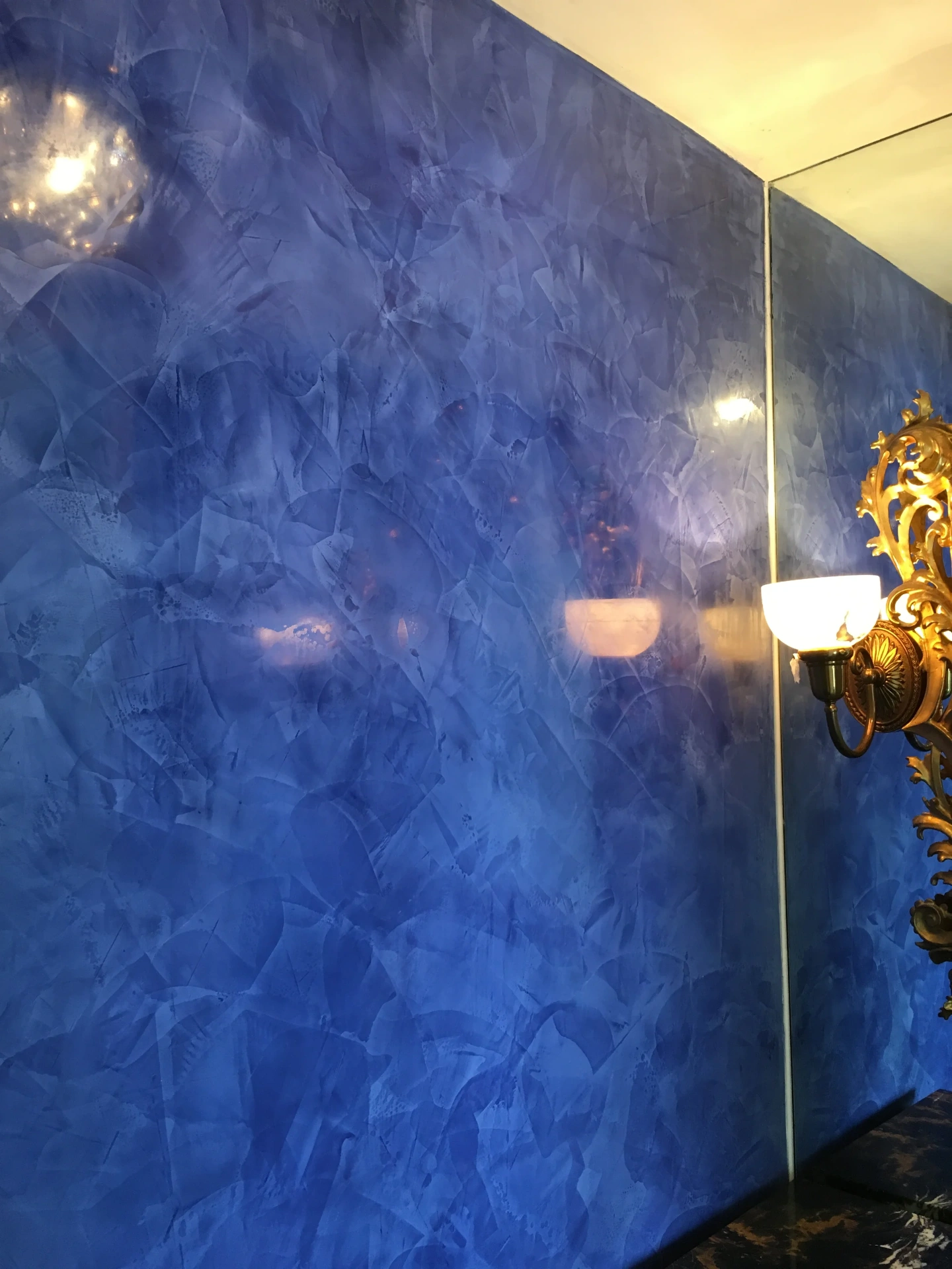 Detailed Venetian cobalt close-up with hand-troweled movement and burnish, DFW